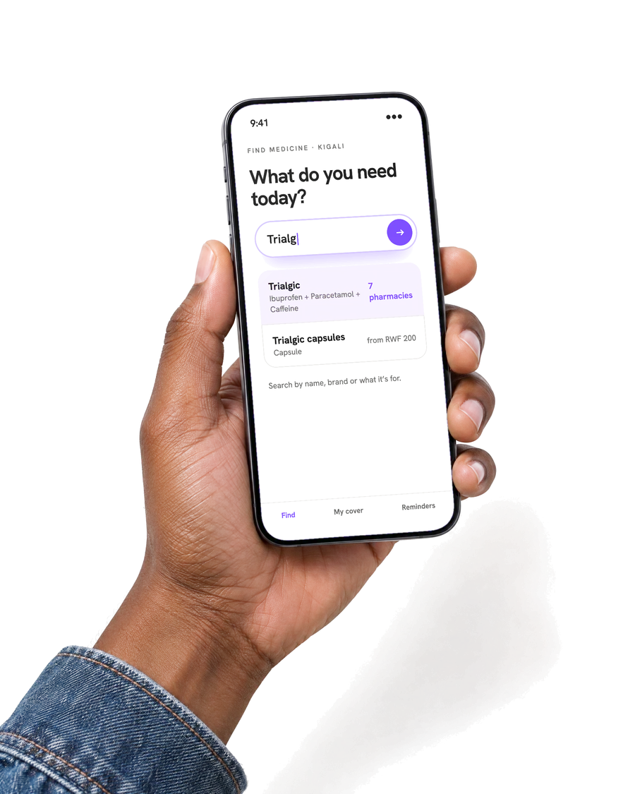 A hand holding a phone with the Zoner app open, searching for Trialgic