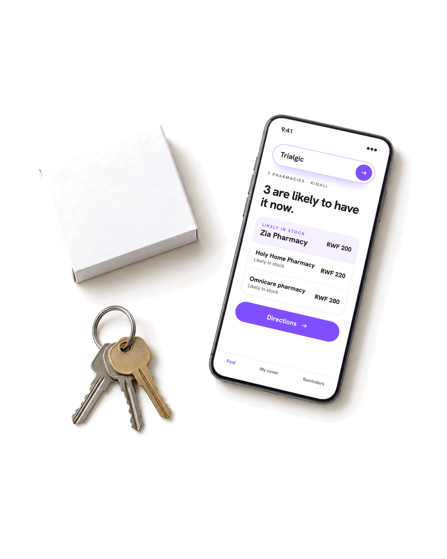 A phone on a table showing three Kigali pharmacies with Trialgic in stock, next to keys and a medicine box